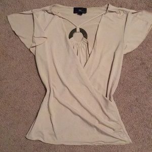 Cream blouse with neck accessory